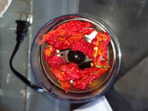 dried Ghost Peppers in the coffee grinder